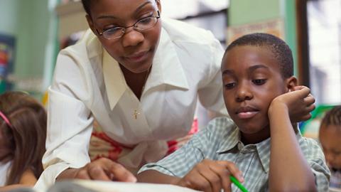teacher and student reading