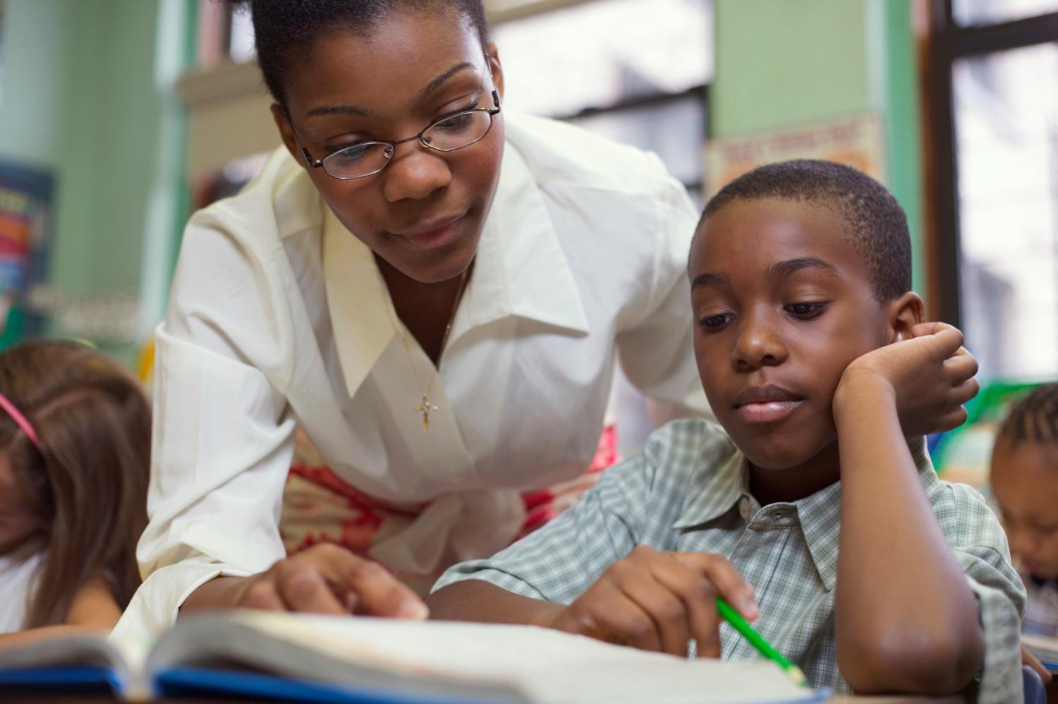 teacher and student reading